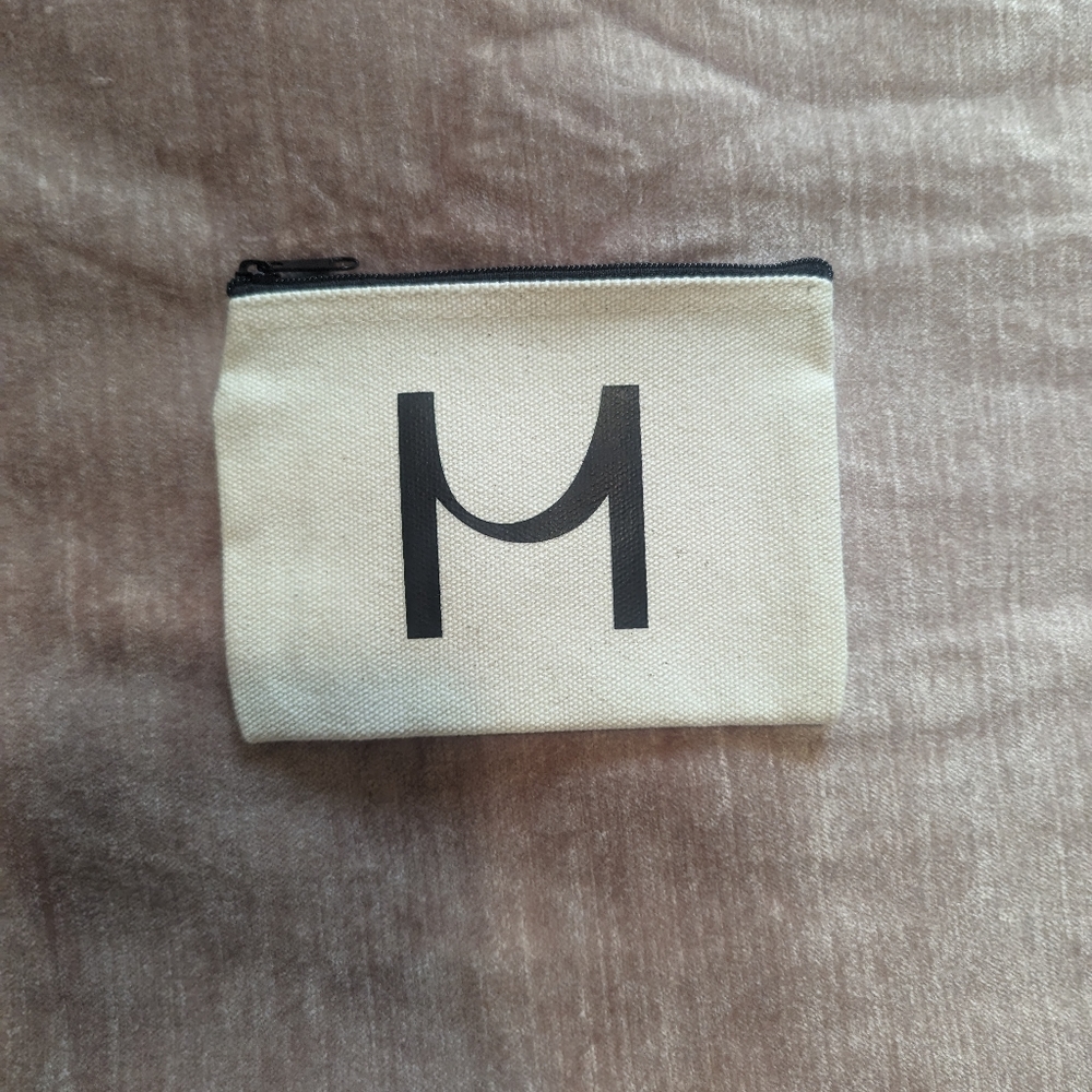 Free with Purchase - Mini M Pouch